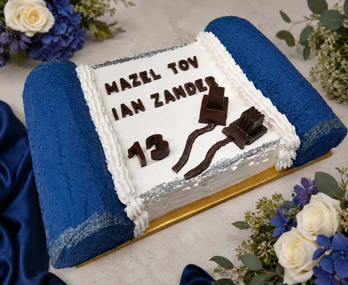 Torah scroll themed Mazel Tov cake with blue fondant for a bar mitzvah